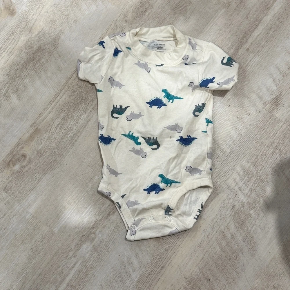 Carter's Cream Bodysuit with Blue and Gray Dinosaurs